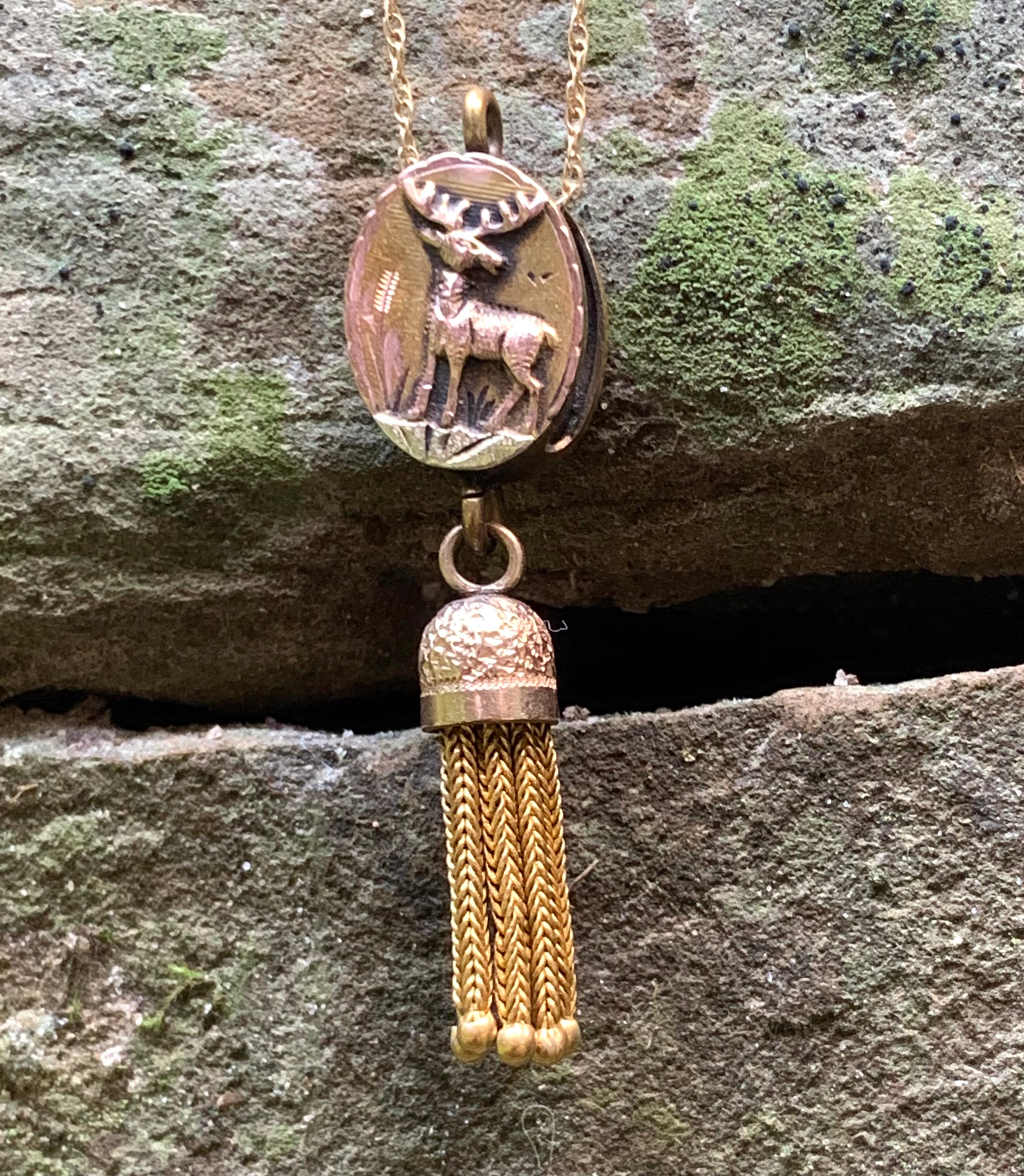 Elk pendant with tassel