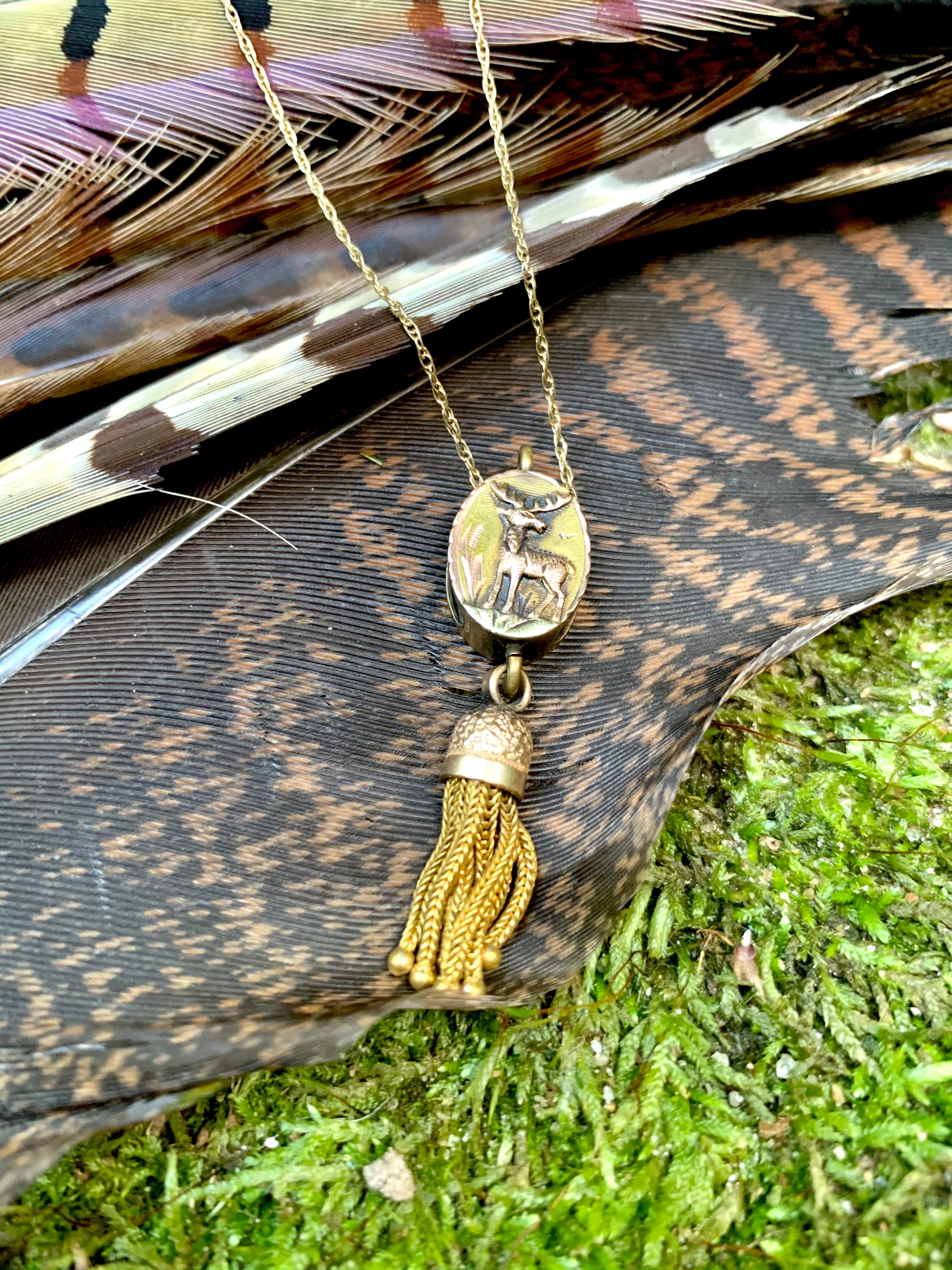 Elk pendant with tassel