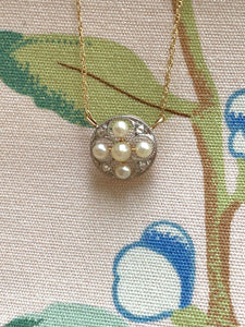 Pearl and diamond pendant